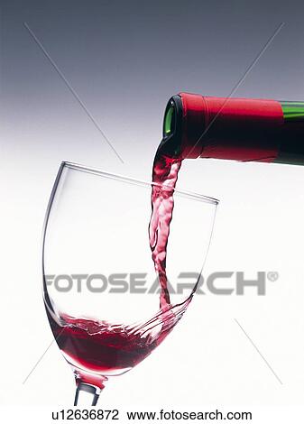 Stock Image - Poured Red Wine. Fotosearch