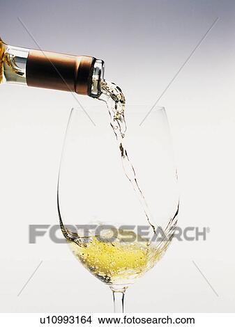 Picture - Poured White Wine. Fotosearch