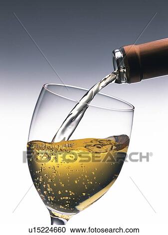 Stock Image - Poured White Wine. Fotosearch