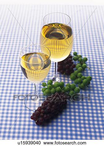 Stock Image - White Wine and Grape, High Angle View. Fotosearch