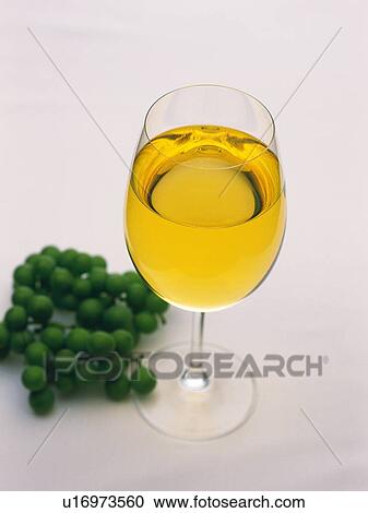 Stock Image - White Wine and Grape, High Angle View. Fotosearch