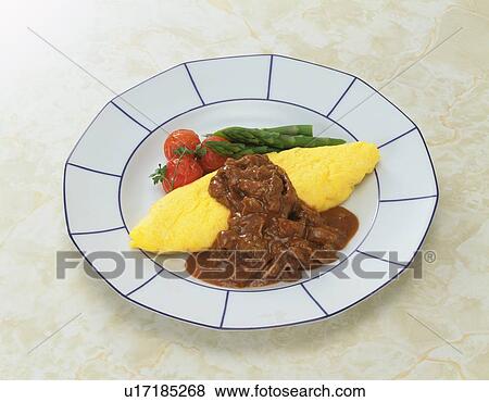An Omelet Containing Fried Rice, High Angle View View Large Photo Image Stock Photo - An Omelet Containing Fried Rice, High Angle View. Fotosearch