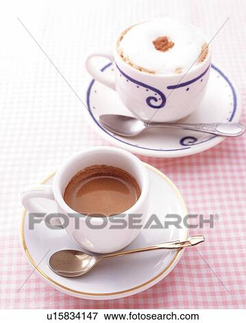 Stock Photo - Espresso and Cappuccino, High Angle View. Fotosearch