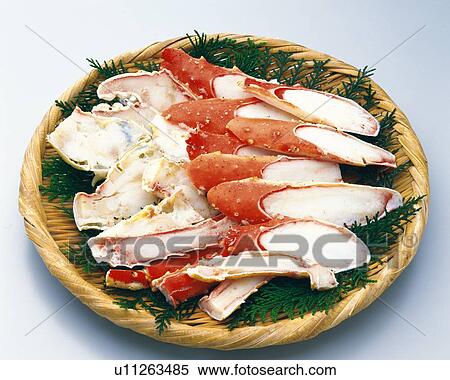 Boiled legs of crab on bamboo basket, high angle view View Large Photo Image Stock Photography - Boiled legs of crab on bamboo basket, high angle view. Fotosearch