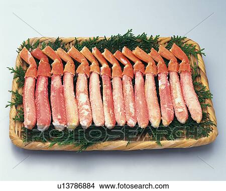 Legs of crab on bamboo basket, high angle view View Large Photo Image Picture - Legs of crab on bamboo basket, high angle view. Fotosearch