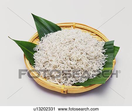White baits on bamboo basket, high angle view View Large Photo Image Stock Image - White baits on bamboo basket, high angle view. Fotosearch