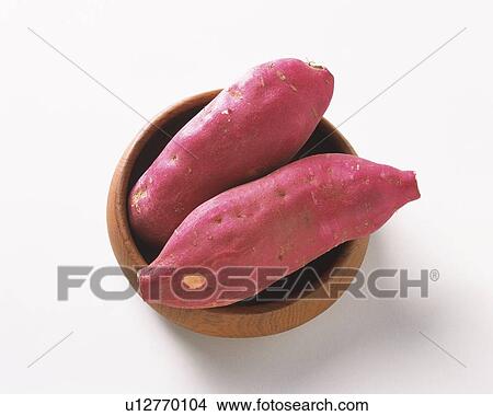Sweet potatoes on bamboo basket, high angle view View Large Photo Image Picture - Sweet potatoes on bamboo basket, high angle view. Fotosearch