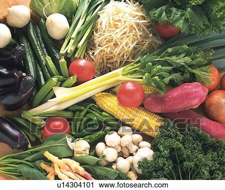 Stock Image - Variety types of vegetables, high angle view, close up. Fotosearch
