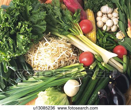 Stock Photograph - Variety types of vegetables, high angle view, close up. Fotosearch