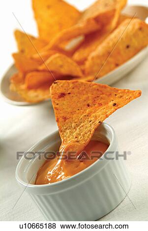 Chips in caso dip View Large Photo Image Stock Photo - Chips in caso dip . Fotosearch