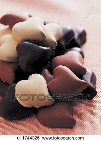 Close-Up, Heart Shaped, Heap, Focus On Foreground, Assorted Chocolate View Large Photo Image Stock Photograph - Close-Up, Heart Shaped, Heap, Focus On Foreground, Assorted Chocolate. Fotosearch