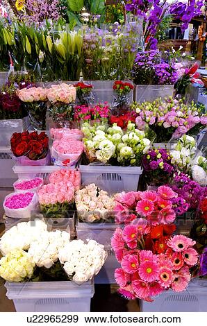 Stock Photo - Different flower bouquets in baskets. Fotosearch