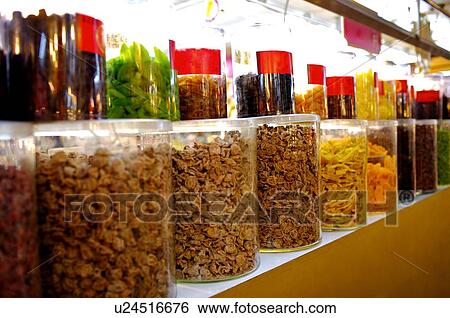 Dried goods in jars, on display in a store View Large Photo Image Stock Photograph - Dried goods in jars, on display in a store. Fotosearch