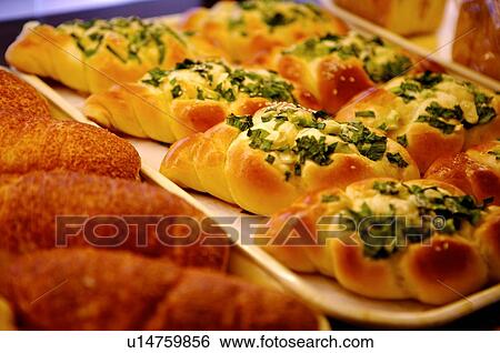 Two trays of fresh bread on display View Large Photo Image Stock Photograph - Two trays of fresh bread on display. Fotosearch