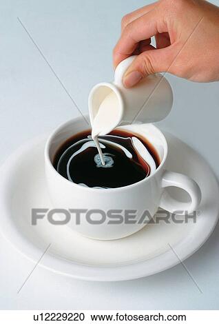 Stock Image - caffeine, hot beverage, coffee beans, cafe, beans, grinding. Fotosearch