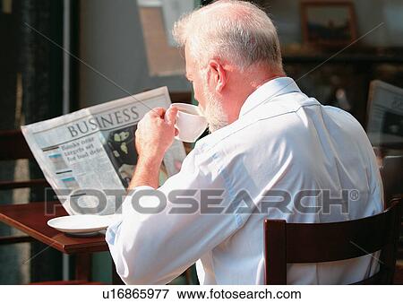 Stock Photo - hot beverage, cappuccino, coffee, bearded, coffee cup, computer, tea. Fotosearch