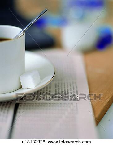 Stock Photo - Beverage, Coffee Cup, Close-Up, Book, At The Edge Of. Fotosearch