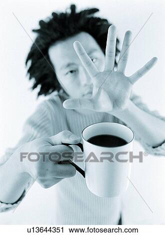 Stock Image - Drink, Beverage, Black Coffee, Holding, One Person. Fotosearch