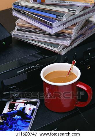 Stock Photo - Mug, Cd Player, Hot Drink, Food And Drink, Player, Indoor. Fotosearch