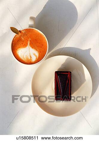 Stock Image - Shadow, Drink, Coffee, Two Objects, Java, Chocolate Cake, Cappuccino. Fotosearch