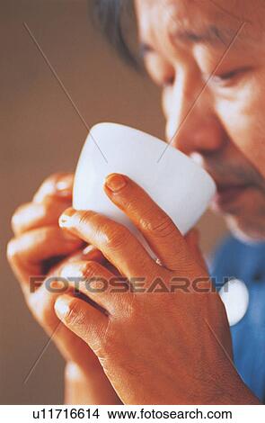 Picture - coffee, human hands, drinking, drink, crockery. Fotosearch