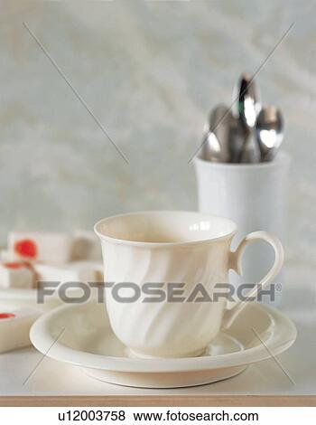Stock Photo - cubes, saucer, silver, java, drink. Fotosearch