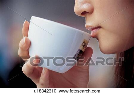 Stock Image - white, expression, one person, chinaware, asian ethnicity, holding, female. Fotosearch