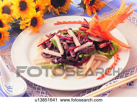 Stock Image - beef, spoon, chopsticks, bamboo, sun flower, saute in Chinese way. Fotosearch