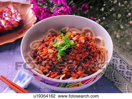 Stock Image - chopsticks, plate, green onion, meat, noodles, food. Fotosearch