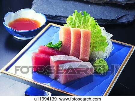 Stock Photo - food, fish, vegetables, radish, wasabi, plate. Fotosearch