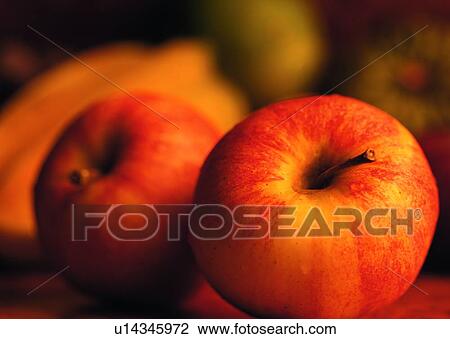 Stock Image - food, fruit, apple, shadow, light, water drop. Fotosearch