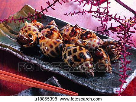 Stock Photo - food, spiral shell, plant, chop sticks. Fotosearch