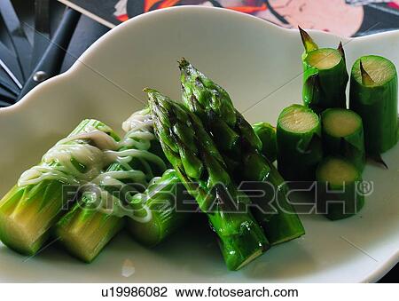 Stock Image - plate, food, sauce, asparagus, salad. Fotosearch