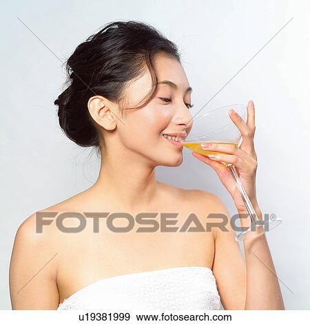 Stock Photo - Asian Ethnicity, Close-Up, Cheerful, Black Hair, Alcohol. Fotosearch