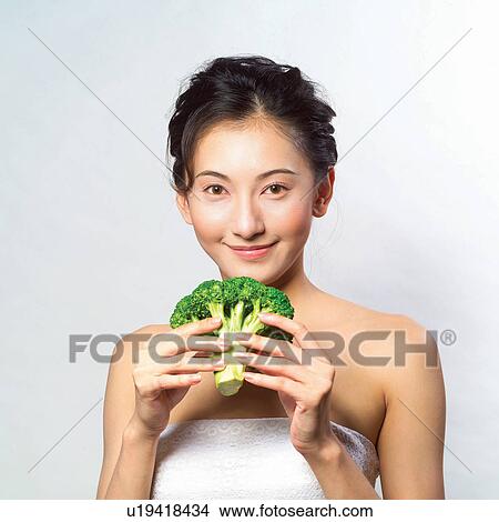 Picture - Black Hair, Close-Up, Broccoli, Asian Ethnicity. Fotosearch