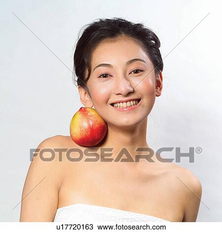 Stock Image - Black Hair, Close-Up, Cheerful, Asian Ethnicity. Fotosearch