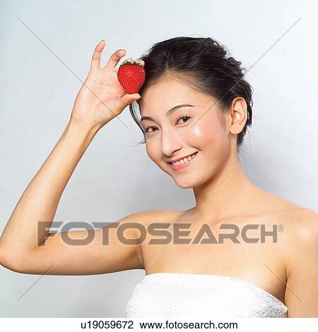 Stock Image - Black Hair, Close-Up, Cheerful, Asian Ethnicity. Fotosearch