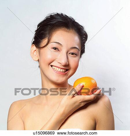Stock Photo - Black Hair, Close-Up, Cheerful, Asian Ethnicity. Fotosearch