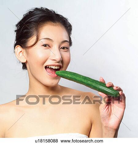 Stock Photo - Black Hair, Close-Up, Cheerful, Asian Ethnicity. Fotosearch
