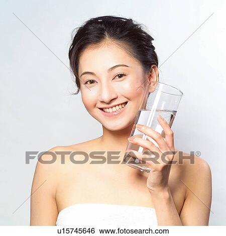 Stock Photograph - Black Hair, Close-Up, Cheerful, Asian Ethnicity. Fotosearch