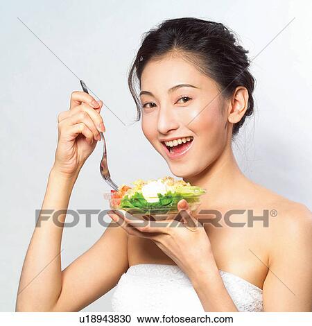 Stock Image - Black Hair, Close-Up, Cheerful, Bowl, Asian Ethnicity. Fotosearch