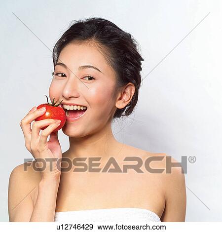Eating, White Background, Happiness, Young Adult, Beauty View Large Photo Image Stock Photo - Eating, White Background, Happiness, Young Adult, Beauty. Fotosearch