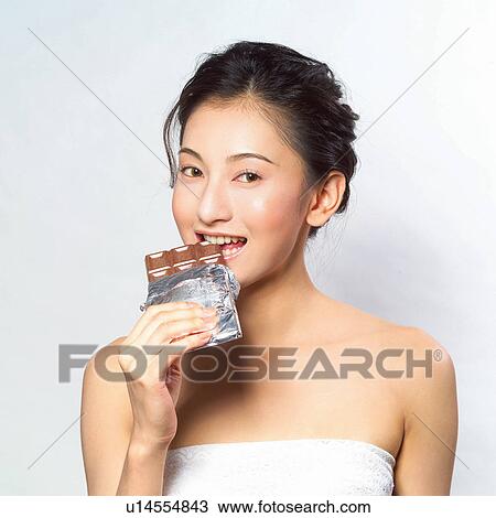 Stock Image - Hair Back, Portrait, Close-Up, Head And Shoulders, Food And Drink, Holding. Fotosearch