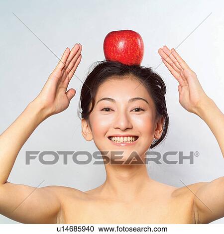 Stock Image - Happiness, Healthy Eating, Fruit, Healthy Lifestyle, Apple, Indoor. Fotosearch