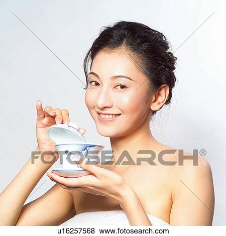 Happiness, Healthy Eating, Holding, White Background, Looking At Camera View Large Photo Image Stock Photo - Happiness, Healthy Eating, Holding, White Background, Looking At Camera. Fotosearch