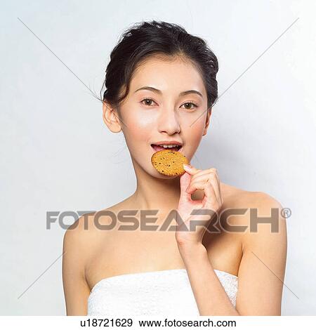 Health & Beauty, Asian Ethnicity, Mouth Open, One Person, Holding View Large Photo Image Stock Photo - Health & Beauty, Asian Ethnicity, Mouth Open, One Person, Holding. Fotosearch