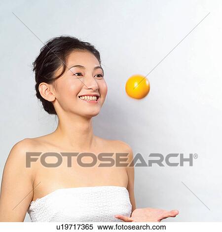 Stock Photography - Healthy Lifestyle, Indoor, White Background, Yellow, Head And Shoulders, One Person. Fotosearch