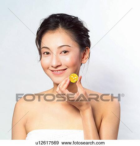 Stock Photo - Healthy Lifestyle, Youth Culture, Close-Up, Looking At Camera, Freshness, Asian Ethnicity. Fotosearch