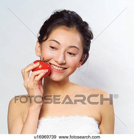 Stock Photo - Human Face, Red, Lifestyles, Happiness, Smiling, Toothy Smile. Fotosearch