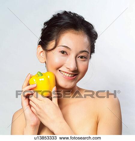 Indoor, Holding, Close-Up, Freshness, Healthy Lifestyle, Smiling View Large Photo Image Stock Image - Indoor, Holding, Close-Up, Freshness, Healthy Lifestyle, Smiling. Fotosearch